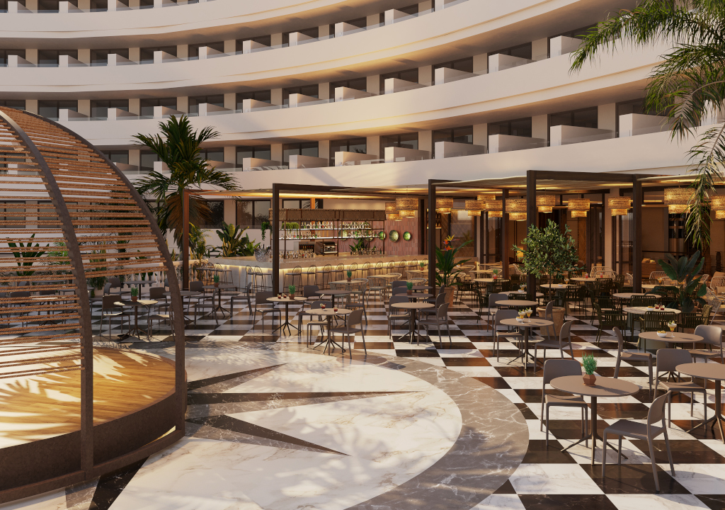 Café-Terrasse in einem modernen Hotel in Tenerife mit Sitzbereichen und Pflanzen.