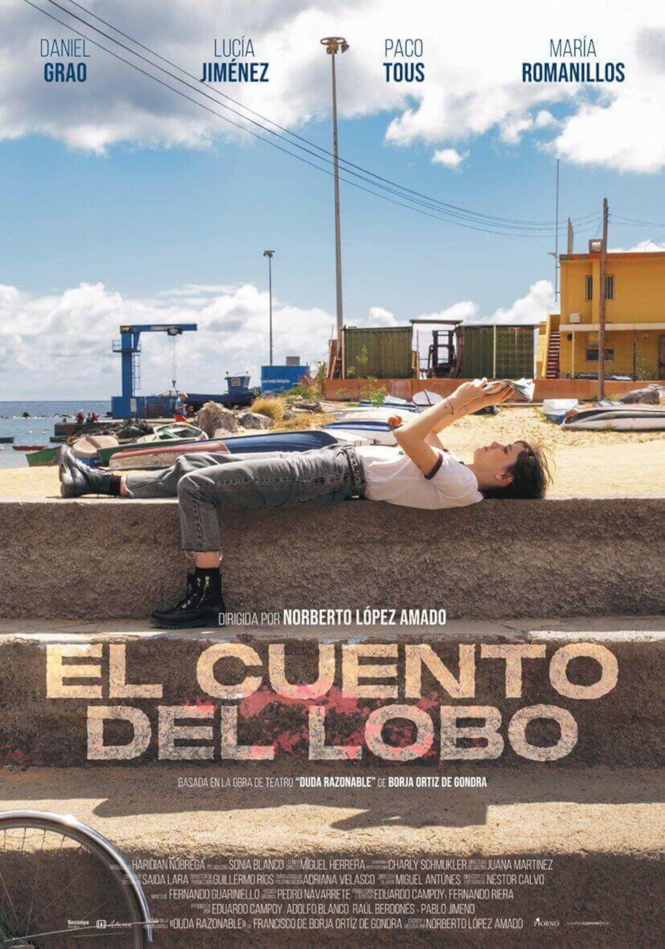 Poster von Die Geschichte vom Wolf mit einer Person, die am Meer auf Teneriffa liegt.