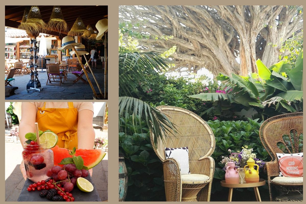 Terrasse mit Tischen, dekorativen Hüten und Sonnenschirmen in einem Restaurant auf Teneriffa.